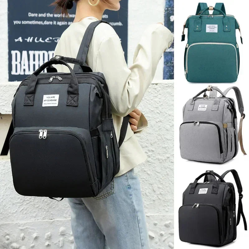 Sac à langer convertible en lit pliable avec 3 emplacements biberons
