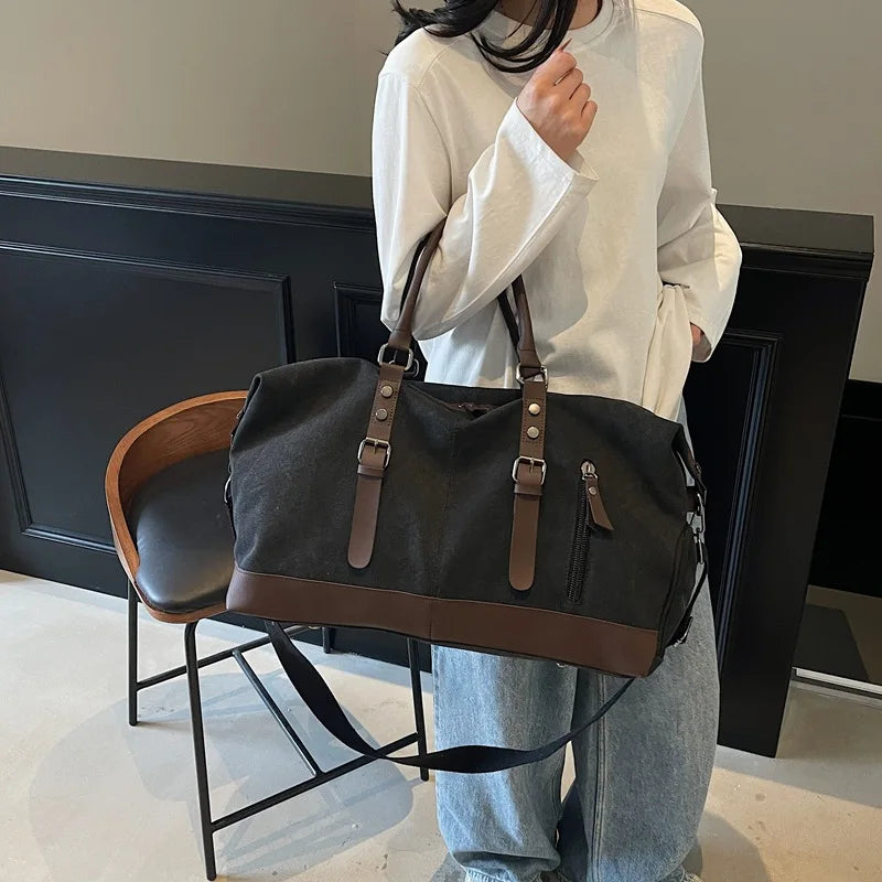 Sac polochon de voyage homme en toile noir et marron avec bandoulière