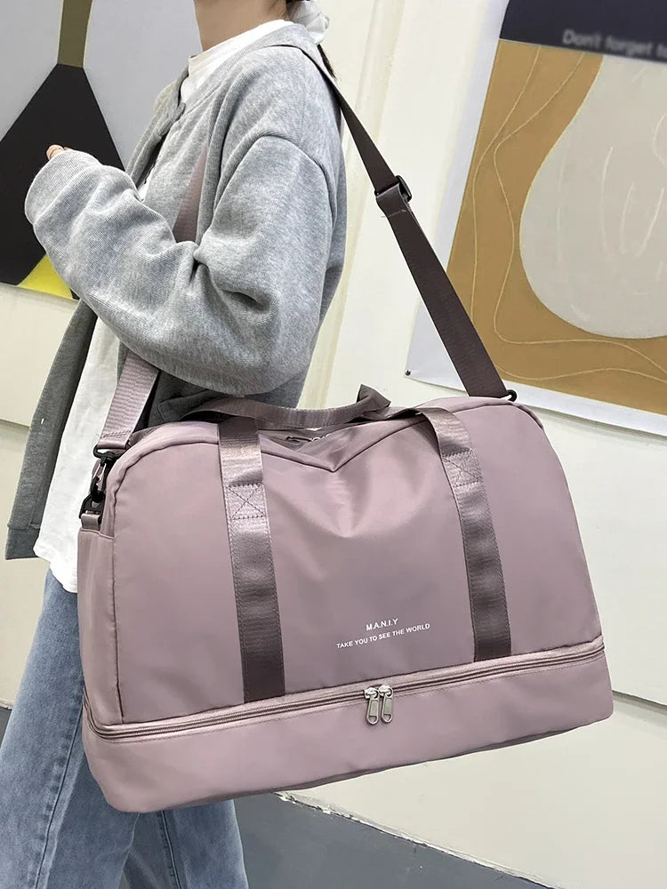 Sac polochon extensible femme rose mauve en nylon à bandoulière