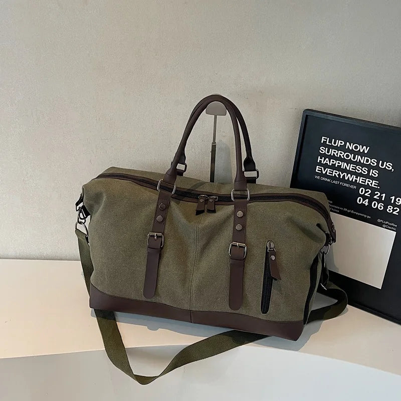 Sac polochon de voyage homme en toile noir et marron avec bandoulière