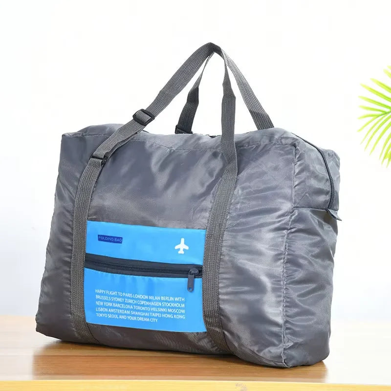 Sac polochon de voyage pliable imperméable gris avec sangle pour valise