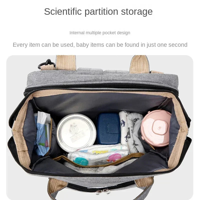 Sac à langer convertible en lit pliable avec 3 emplacements biberons
