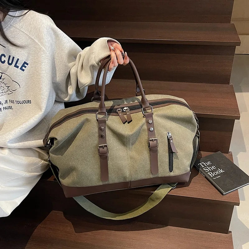 Sac polochon de voyage homme en toile noir et marron avec bandoulière