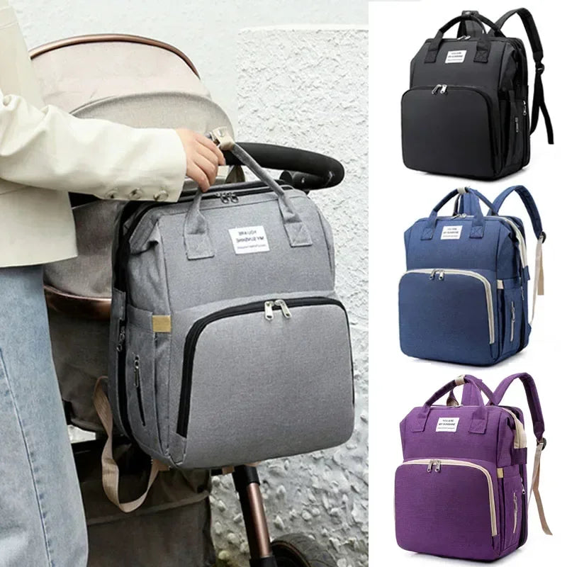 Sac à langer convertible en lit pliable avec 3 emplacements biberons